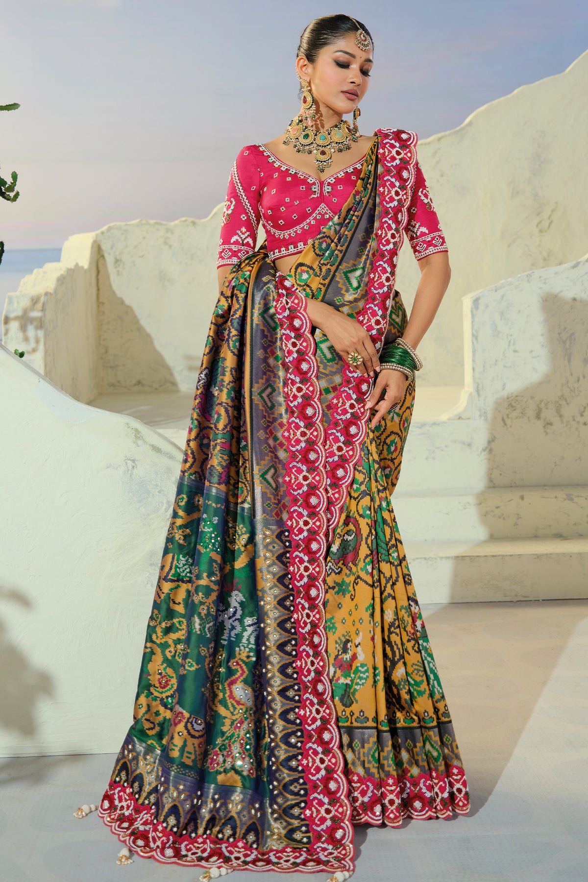 Mustard Silk Traditional Woven Patola Saree with Contrast Beaded Border and Pallu