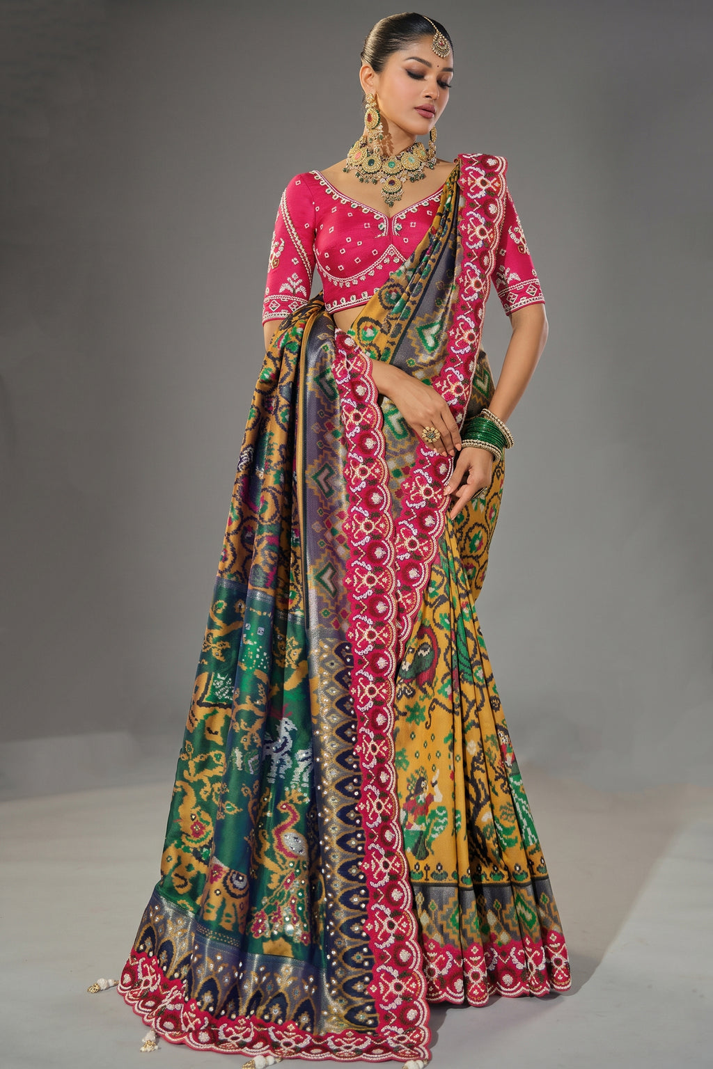 Mustard Silk Traditional Woven Patola Saree with Contrast Beaded Border and Pallu