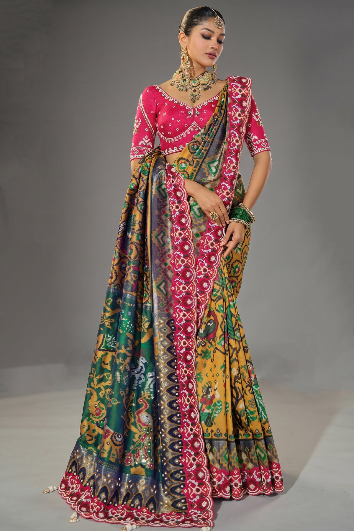 Mustard Silk Traditional Woven Patola Saree with Contrast Beaded Border and Pallu