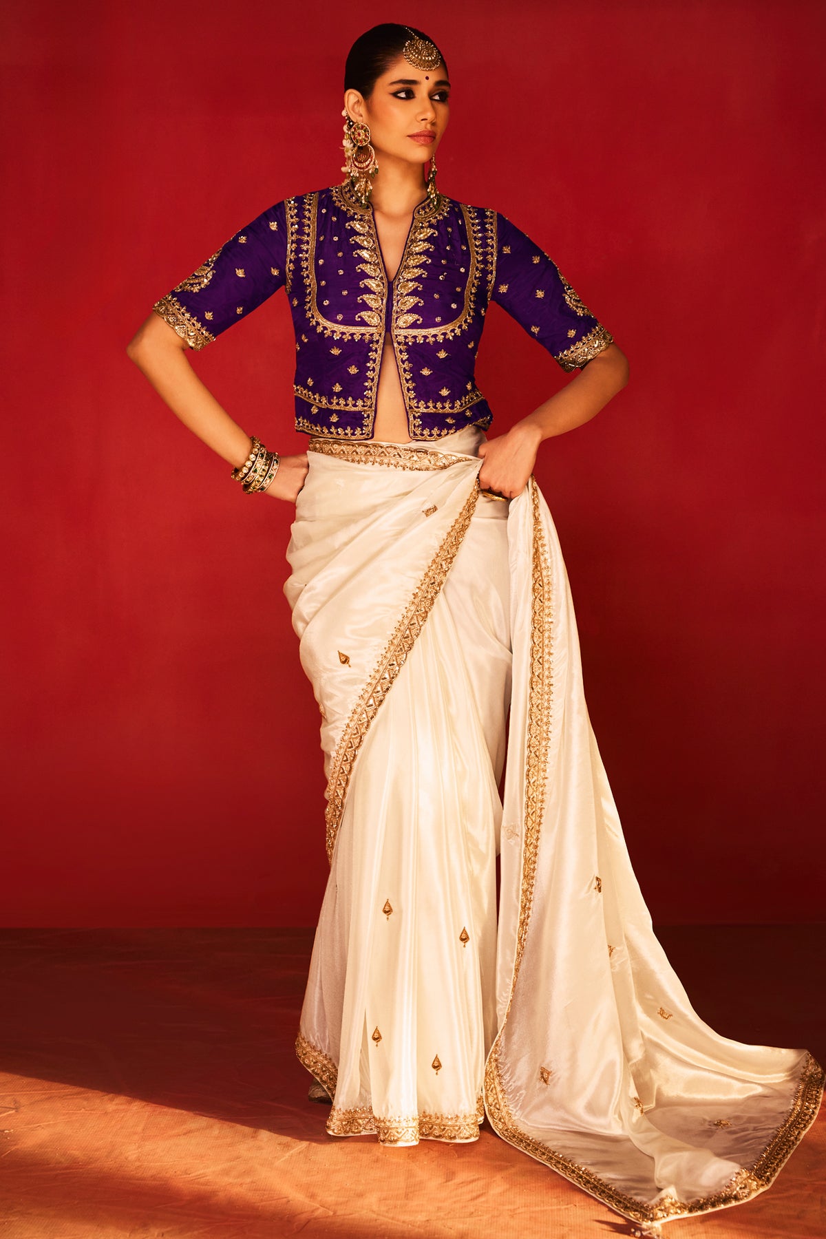 Off White Crepe Silk Beaded Cutdana Worked Saree with Corset Blouse