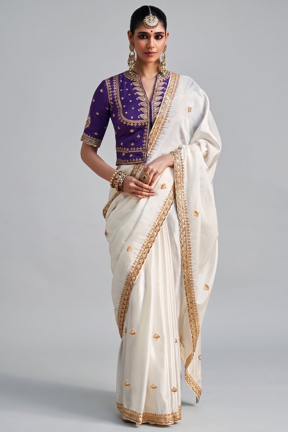 Off White Crepe Silk Beaded Cutdana Worked Saree with Corset Blouse