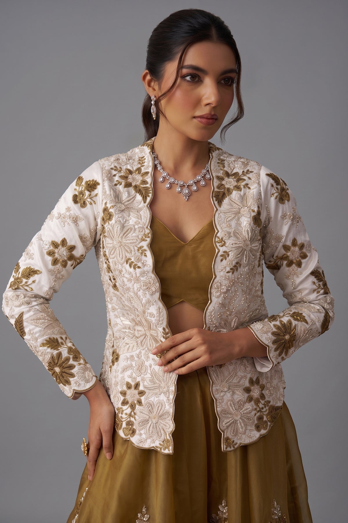 Golden Mustard Tissue Palazzo Set featuring floral embroidered jacket and stylish palazzo in elegant pose.