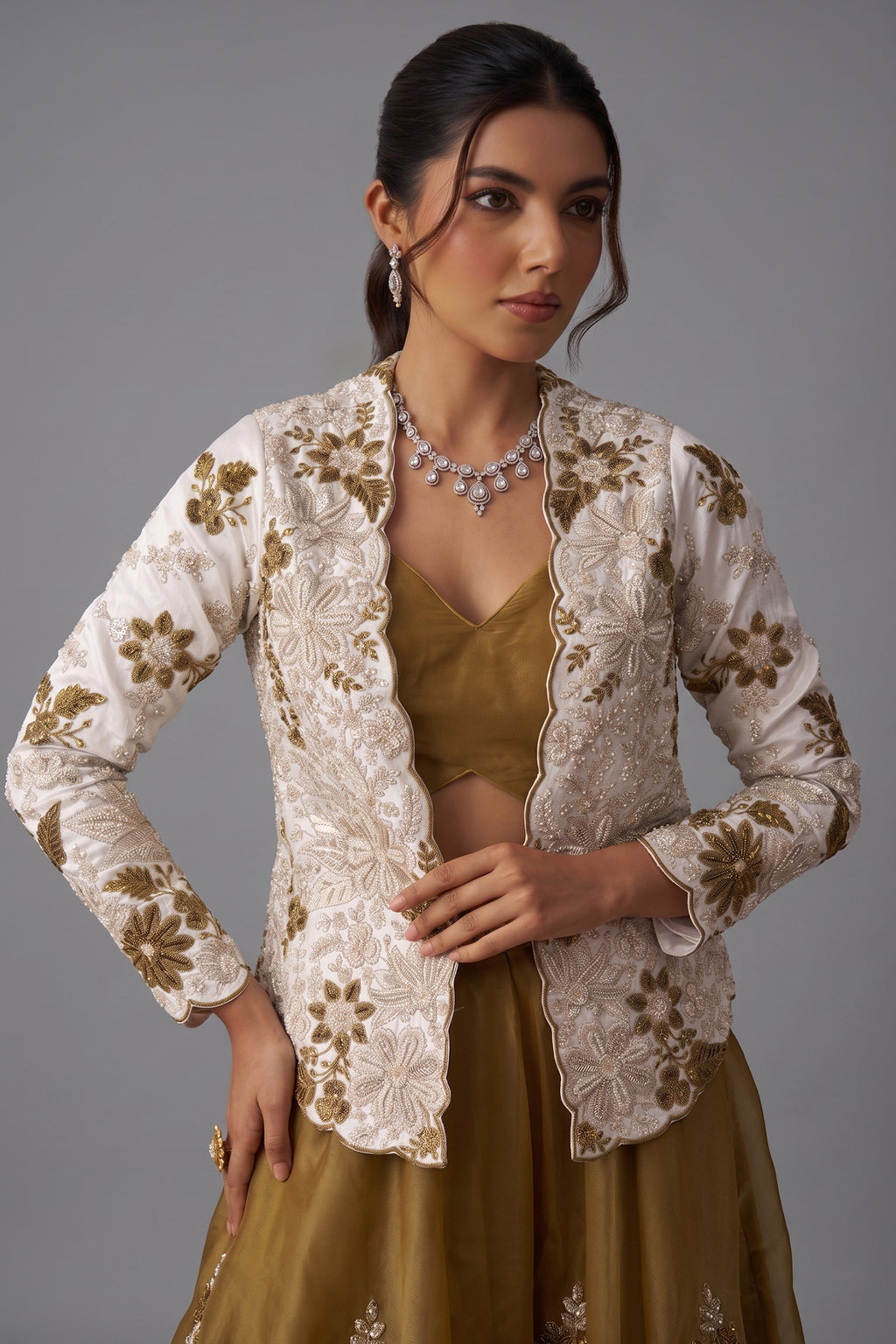 Golden Mustard Tissue Palazzo Set featuring floral embroidered jacket and stylish palazzo in elegant pose.