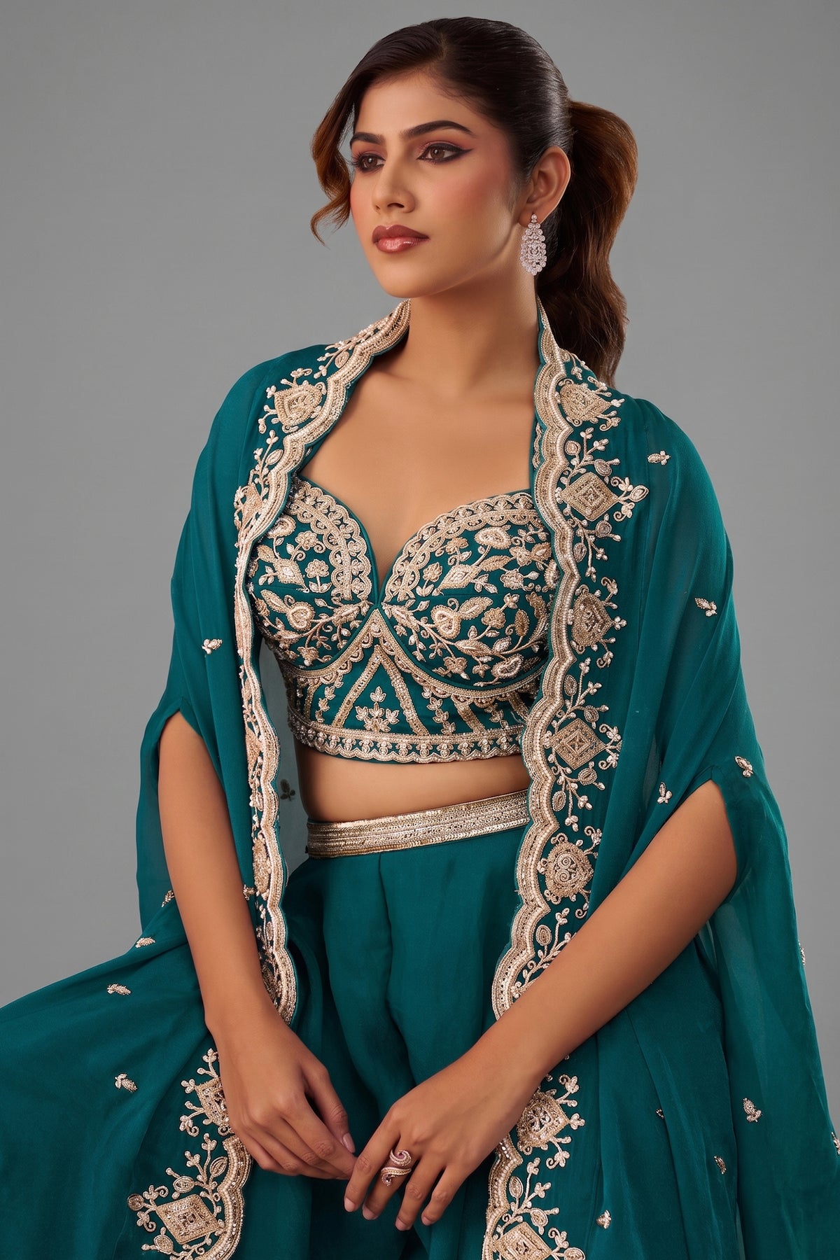 Teal Blue Organza Crop Top Palazzo Set showcasing intricate beadwork and premium embroidery details