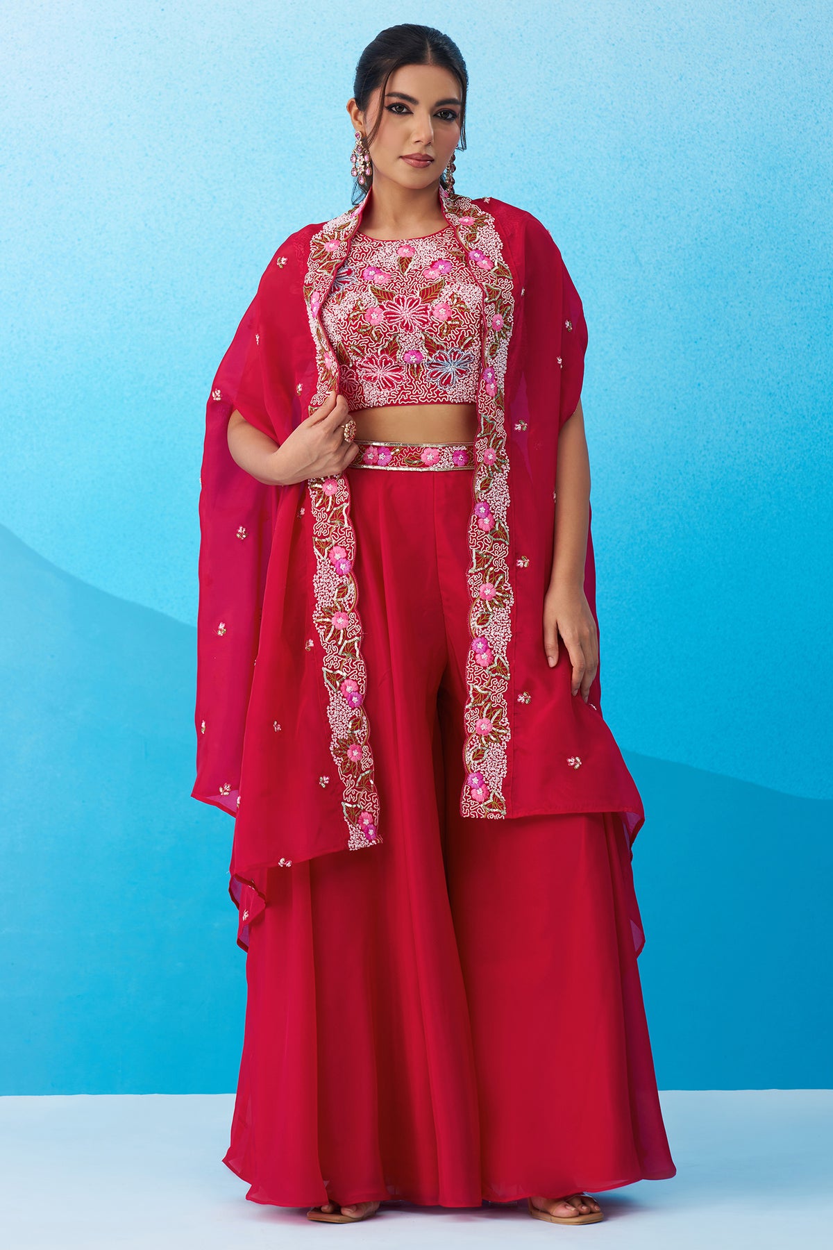 Model wearing Dark Pink Crepe Embroidered Crop Top with Flared Cape and Flared Palazzo Set