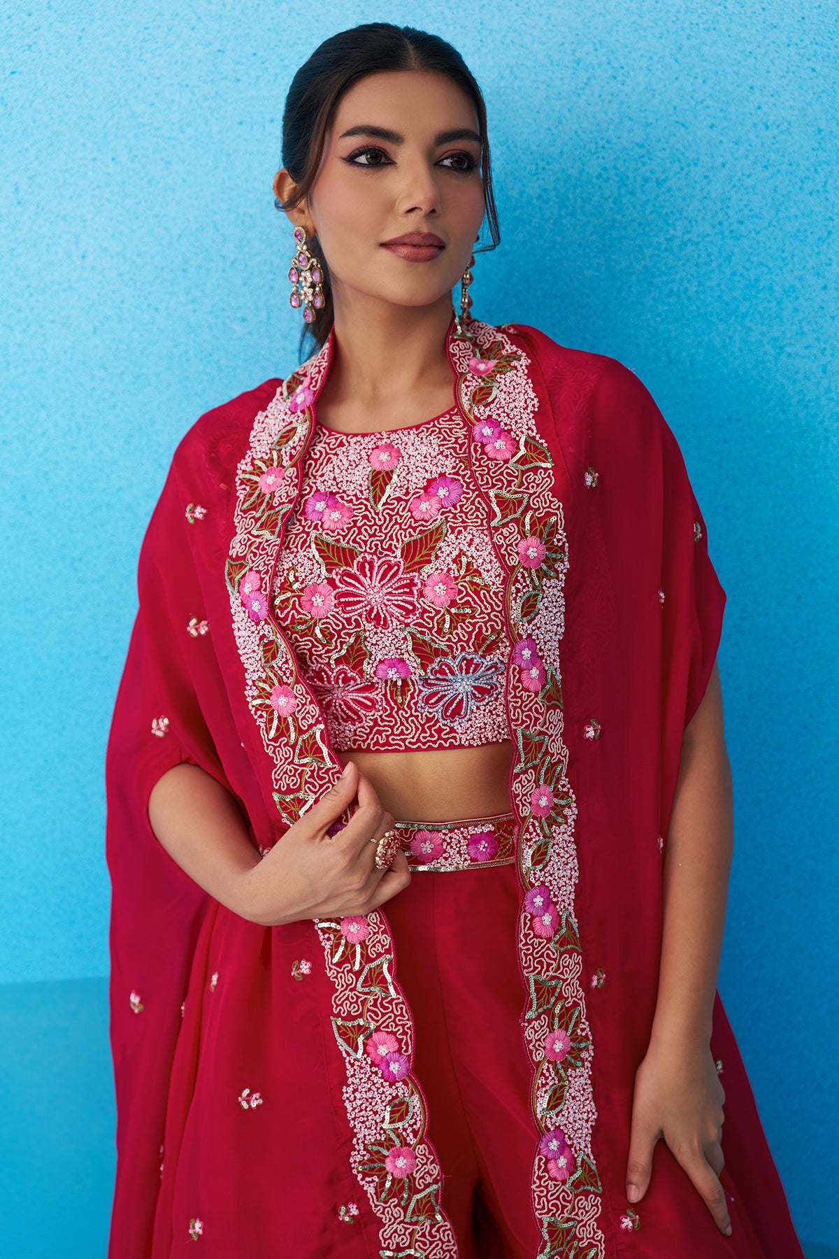Fabric details of Dark Pink Crepe Embroidered Crop Top with Flared Cape and Flared Palazzo Set