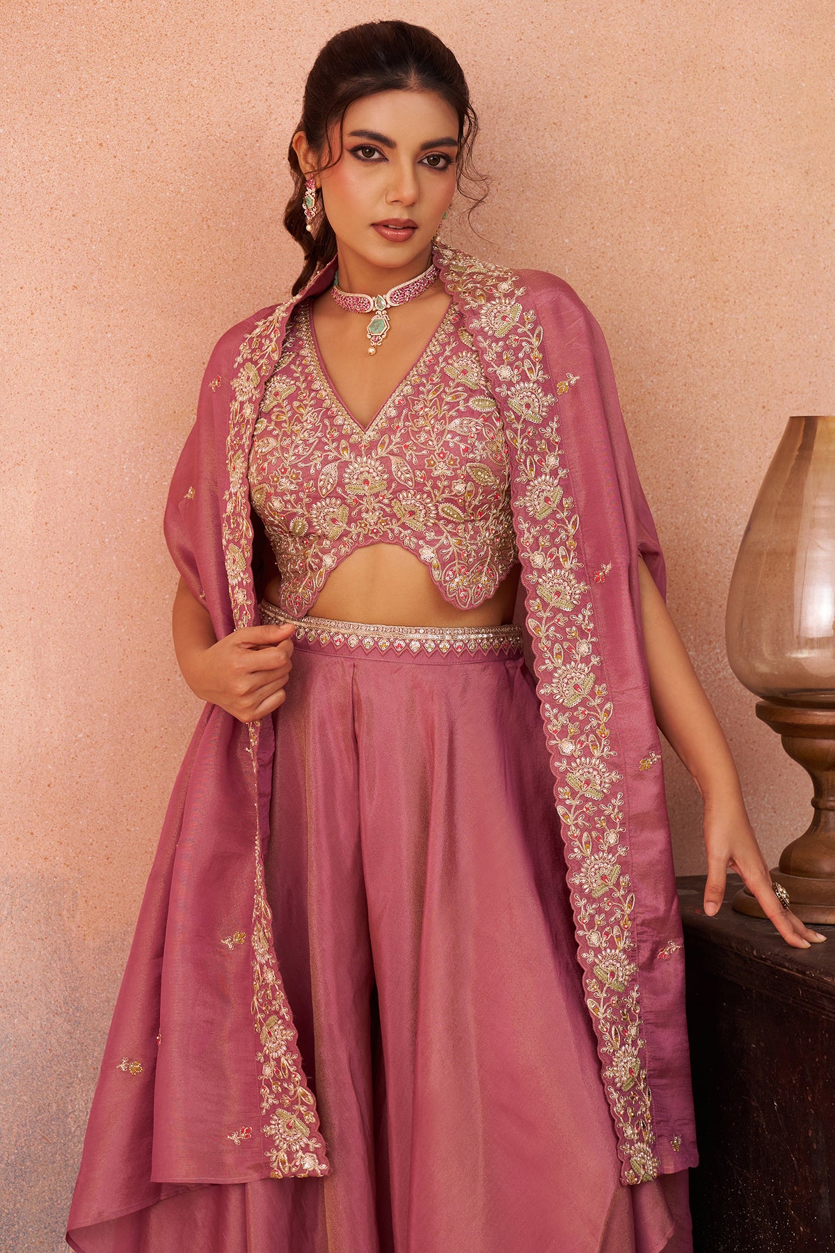 Fabric detail of Coral Pink Crepe Beads Embroidered Crop Top with Cape and Flared Palazzo Set