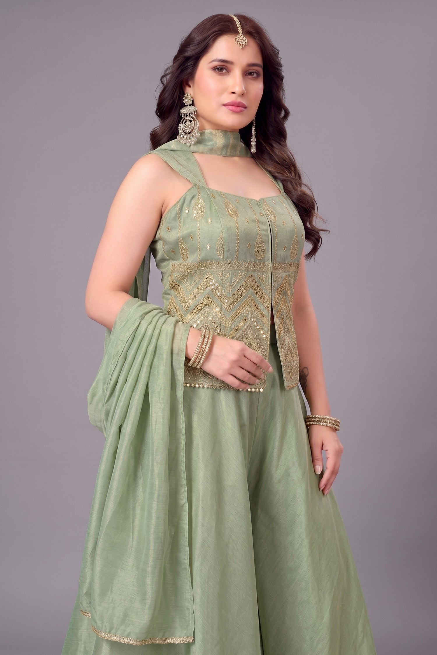 Close up of Light Pista Green Tissue Woven Palazzo Suit with Woven Applique Work and Mirrors