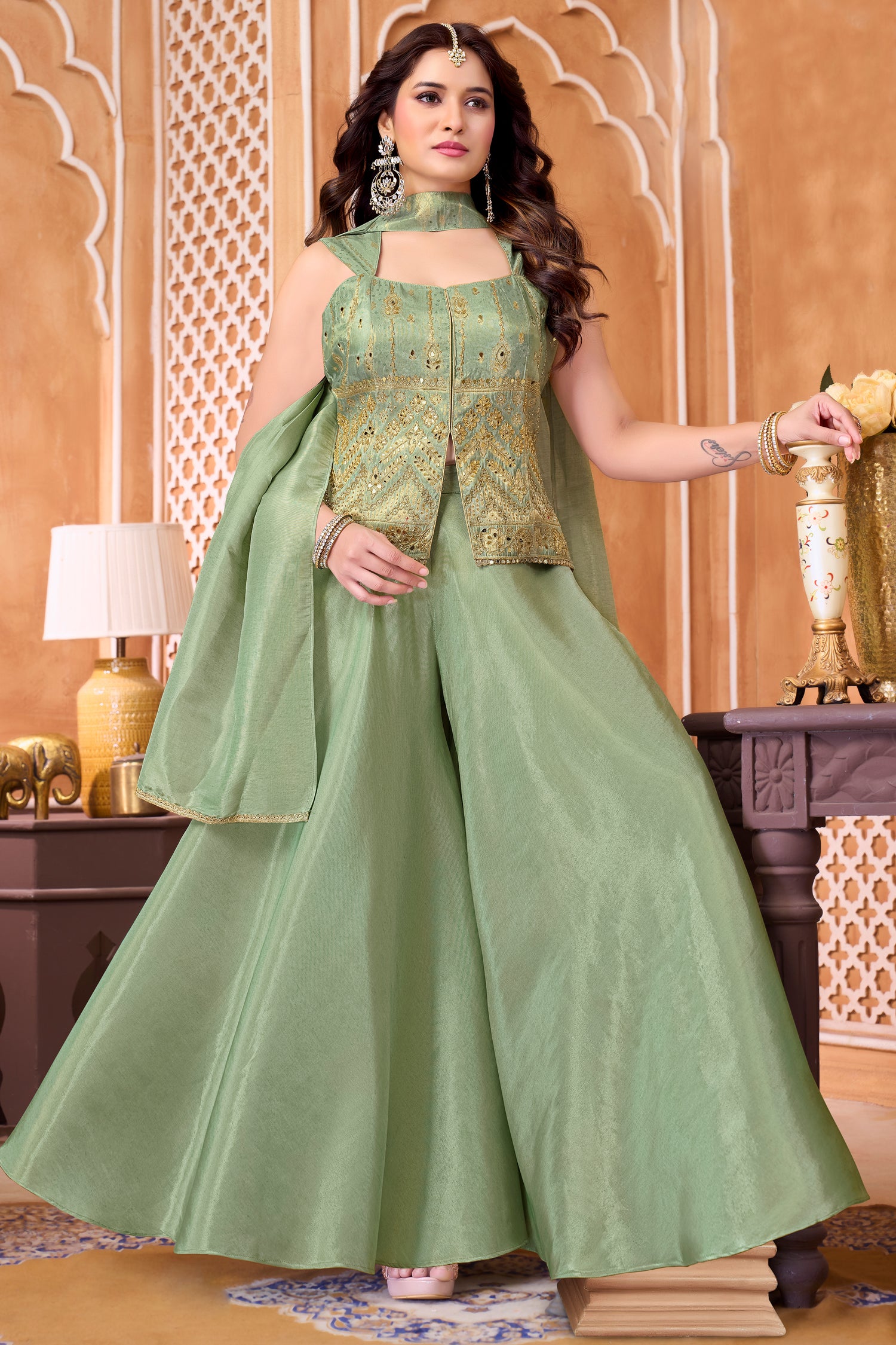 Model wearing Light Pista Green Tissue Woven Palazzo Suit with Woven Applique Work and Flare Pants