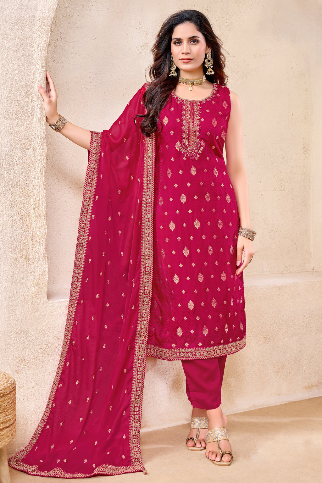 Model wearing Rani Pink Art Silk Woven Straight Cut Suit with Matching Dupatta