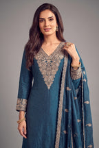 Close up of detailed floral thread embroidery on rama blue palazzo suit