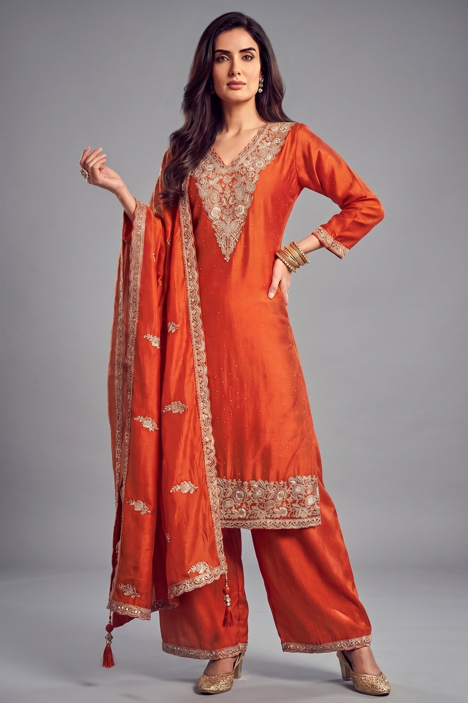 Orange art silk floral embroidered palazzo suit for festive wear Main image