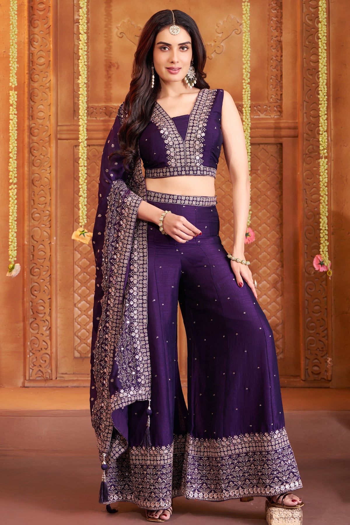 Model wearing purple art silk crop top with super flare palazzos