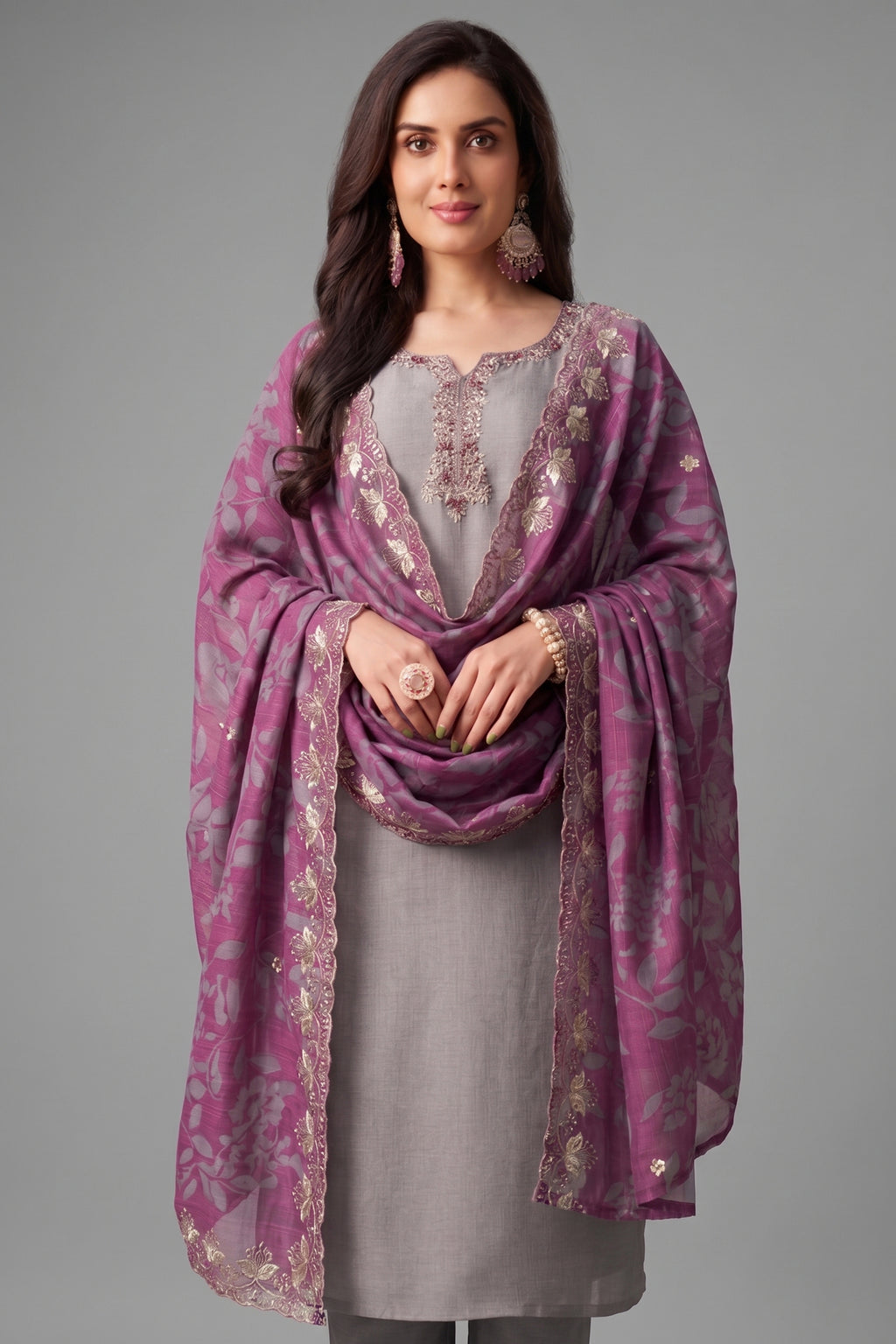 Close up of bead and thread embroidery work on light grey art silk suit