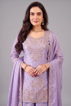 Close up of floral embroidery and applique work on lilac purple chinon silk suit