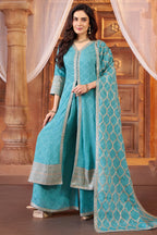 Model wearing sky blue chinon chiffon silk embroidered slit cut palazzo suit