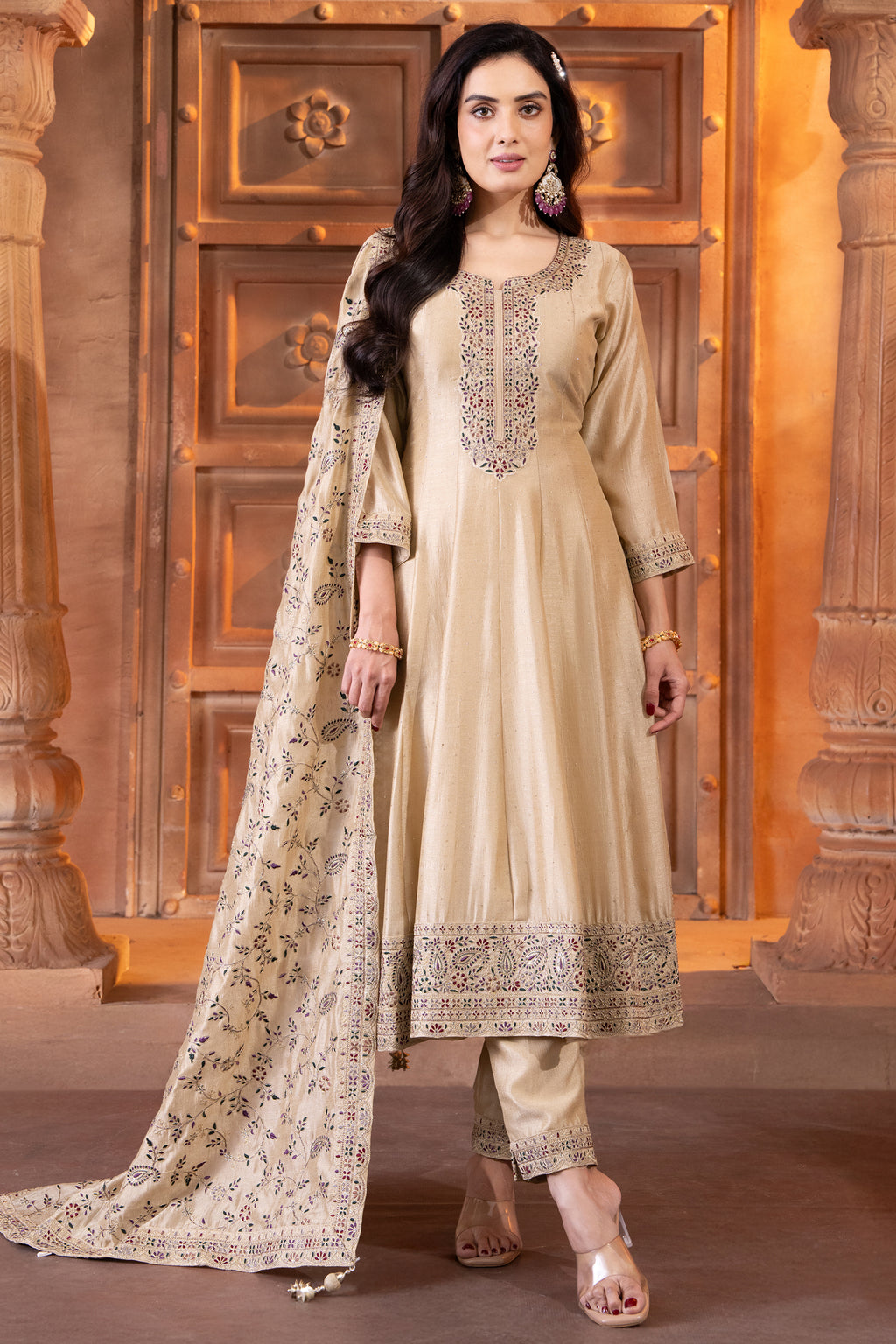 Elegant floor length cream art silk embroidered anarkali suit for festive wear