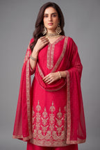 Close up of floral machine embroidery on pink chinon silk suit kurta