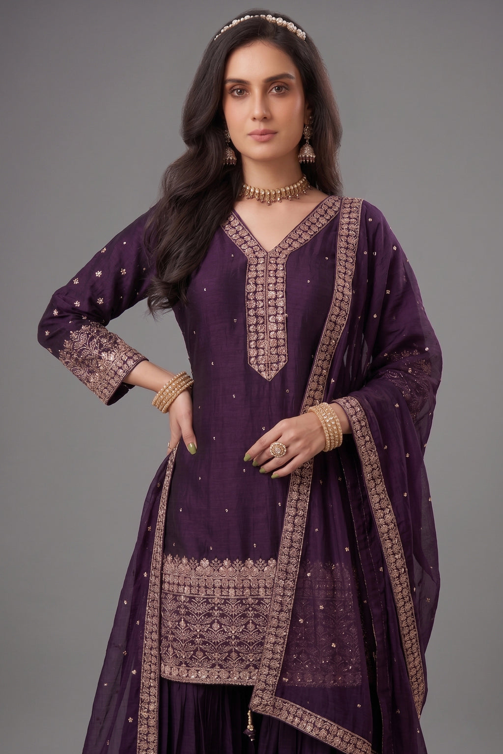 Close up of sequin machine embroidery details on wine art silk sharara suit