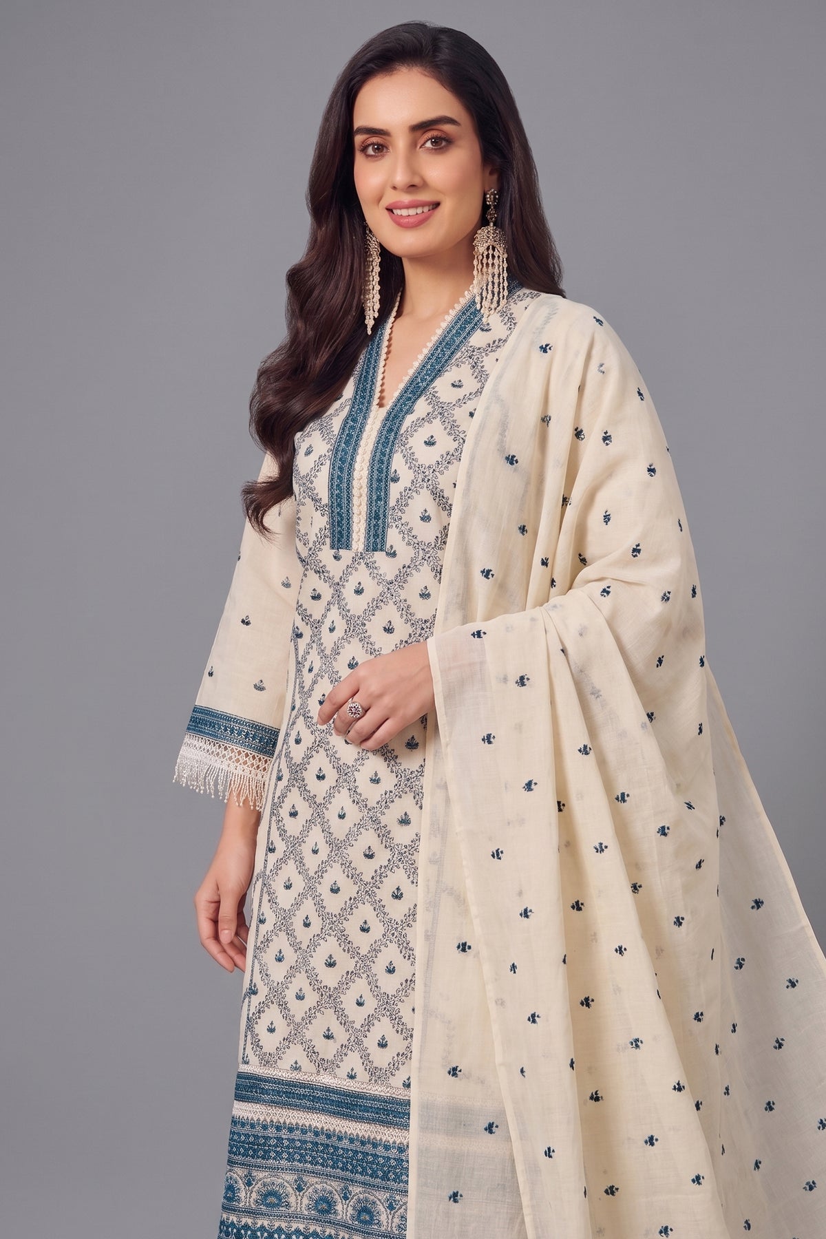 Close up embroidery details on Off White Cotton Embroidered Straight Cut Suit
