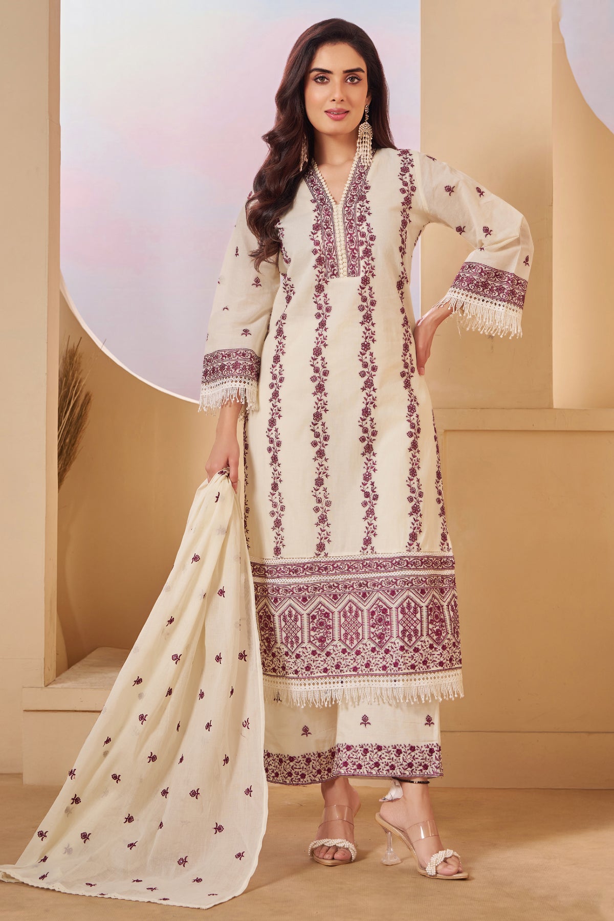 Styling and dupatta pairing with Off White Cotton Embroidered Straight Cut Suit