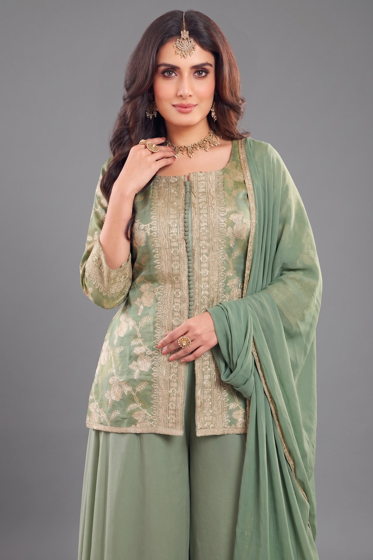 Close-up of woven patterns on Green Tissue Woven Palazzo Suit