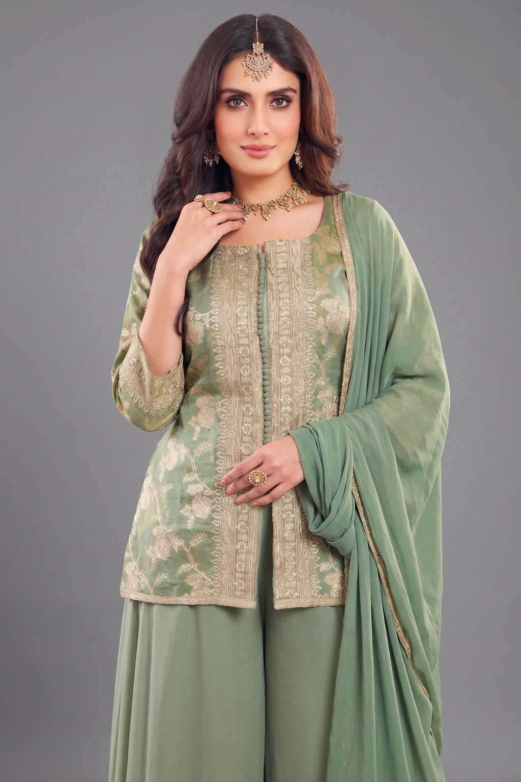 Close-up of woven patterns on Green Tissue Woven Palazzo Suit