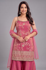 Model wearing a Pink Tissue Floral Woven Sharara Suit with intricate embroidery details.