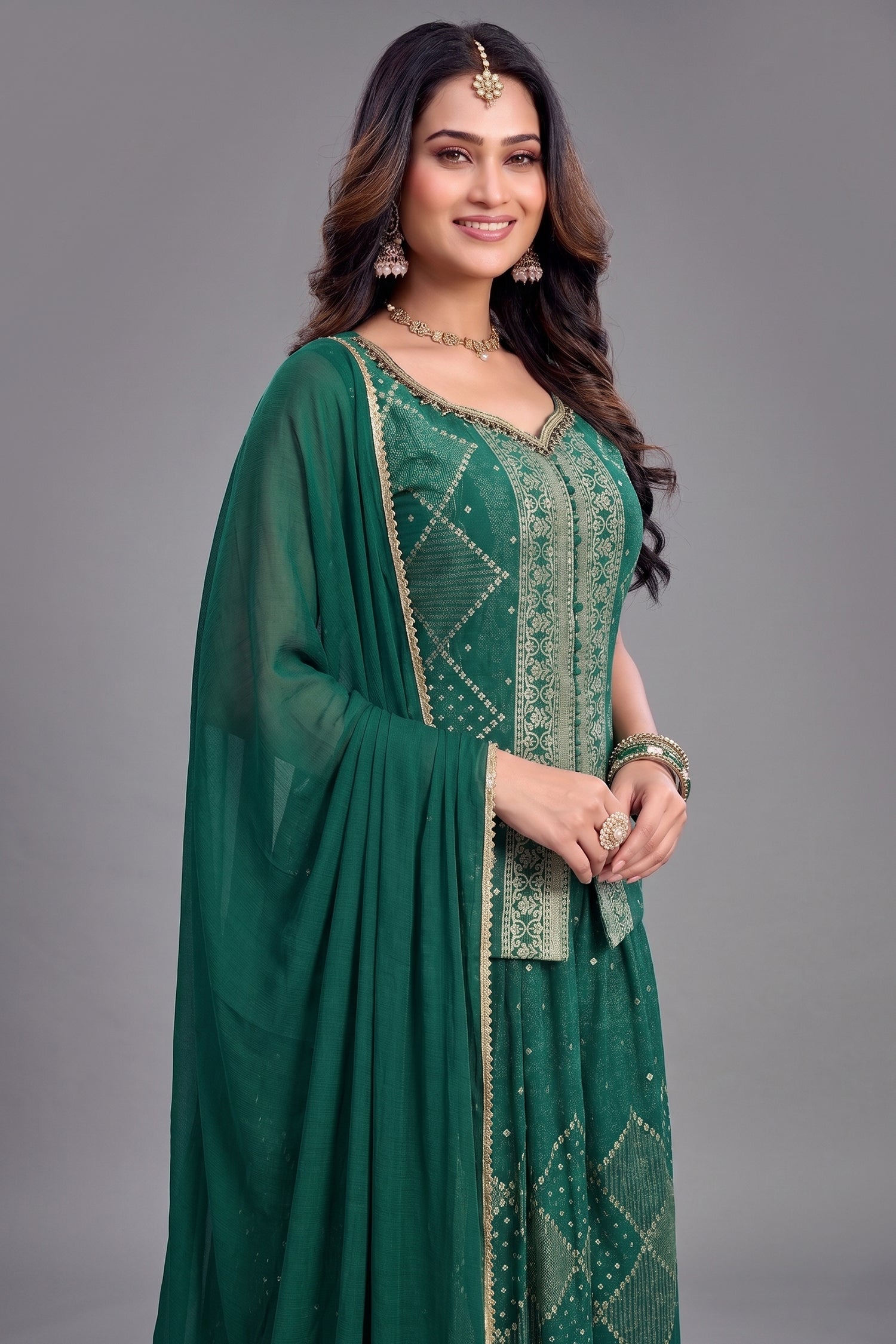 Close-up of intricate woven patterns on Teal Green Georgette Palazzo Suit