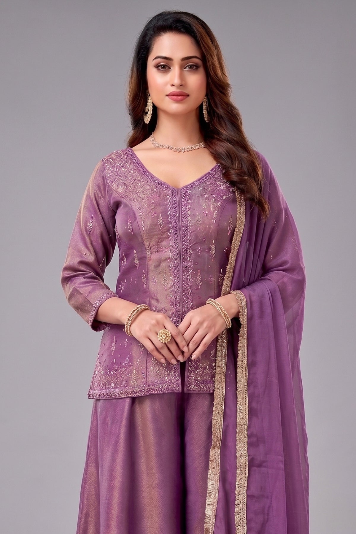 Deep Mauve Purple Tissue Silk Palazzo Suit worn by a model showcasing its stunning mirror embroidery and elegant design.