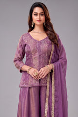Deep Mauve Purple Tissue Silk Palazzo Suit worn by a model showcasing its stunning mirror embroidery and elegant design.