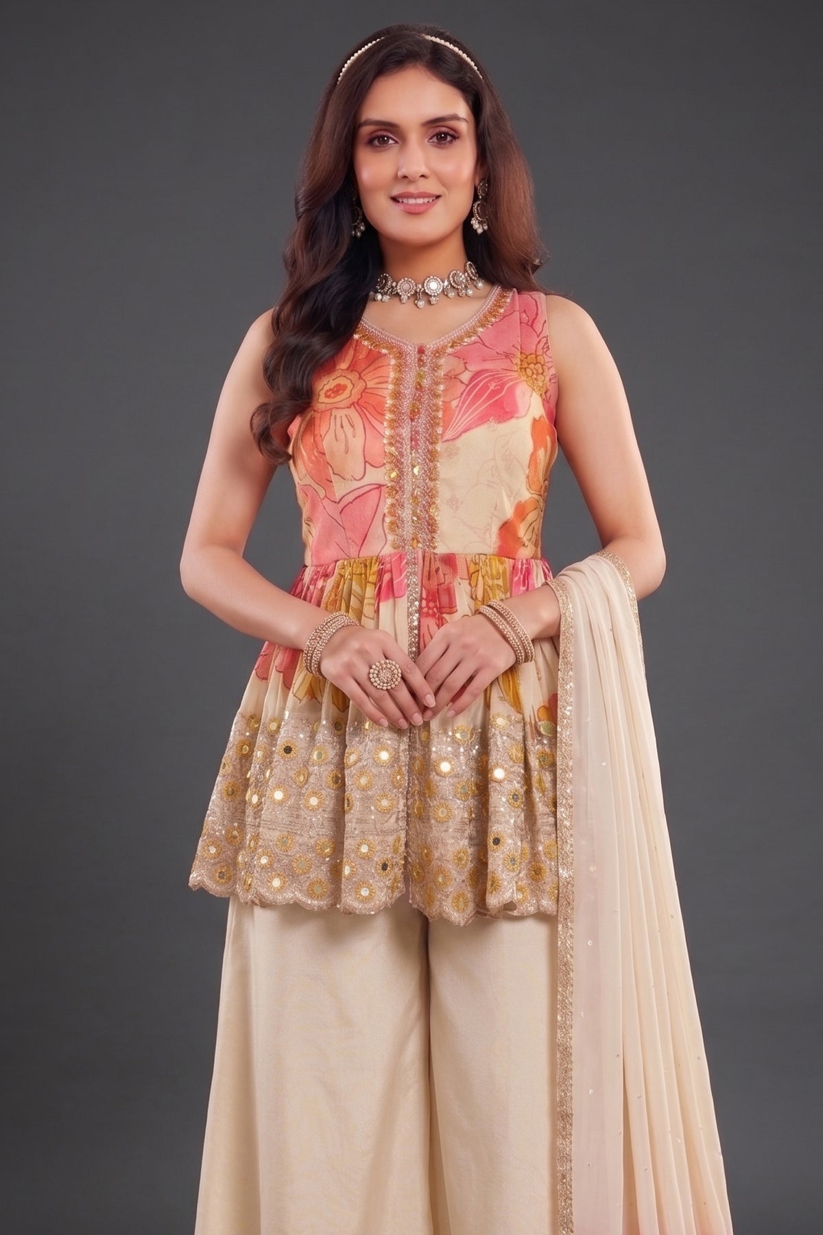 Close-up of mirror work and floral print on Cream Chinon Crepe Silk Peplum Suit