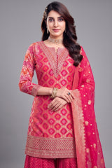 Close-up of Bandhej woven patterns and sequins on Light Pink Georgette Suit