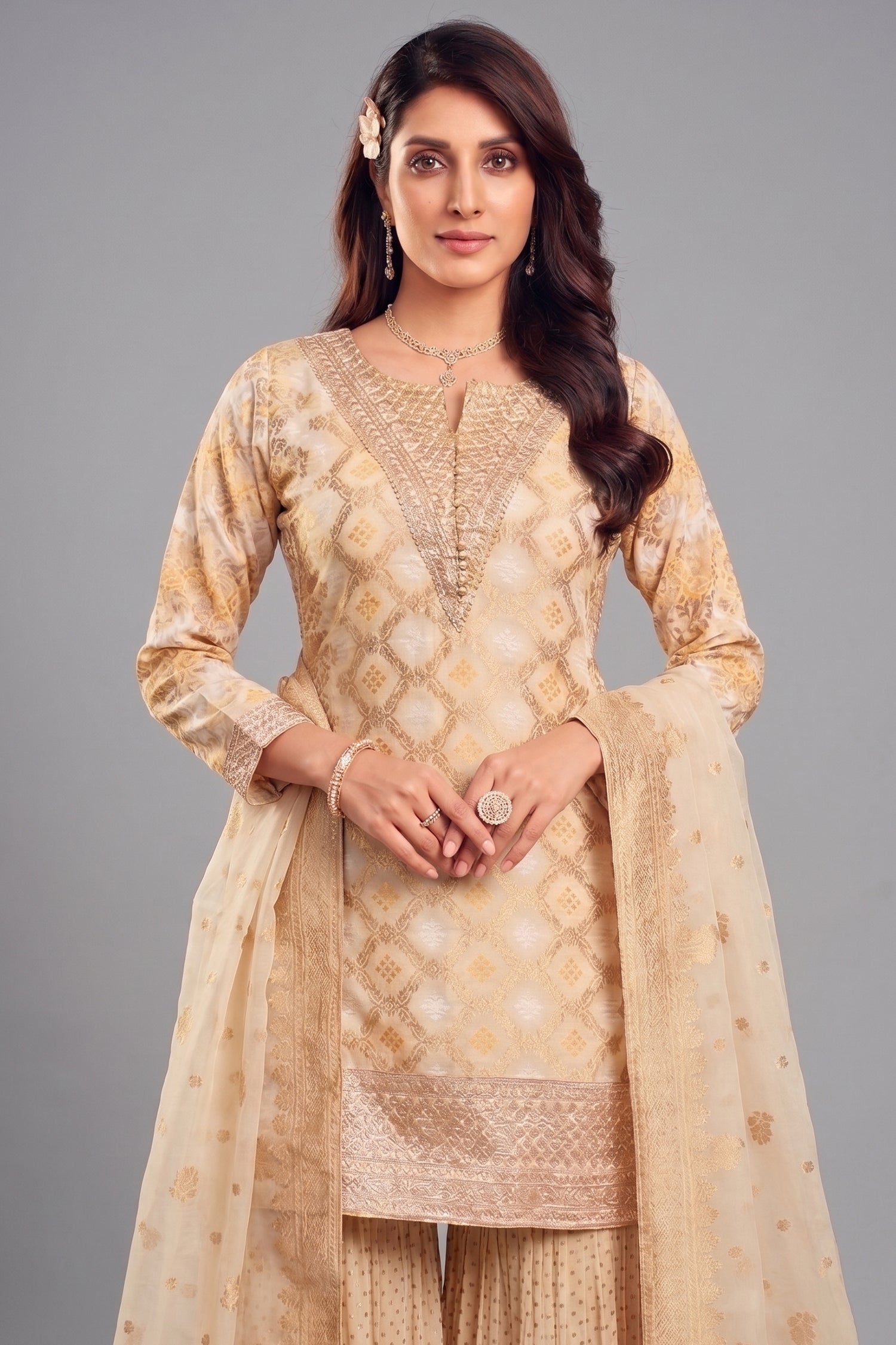 Close-up of Bandhej woven patterns and sequins on Cream Georgette Sharara Suit