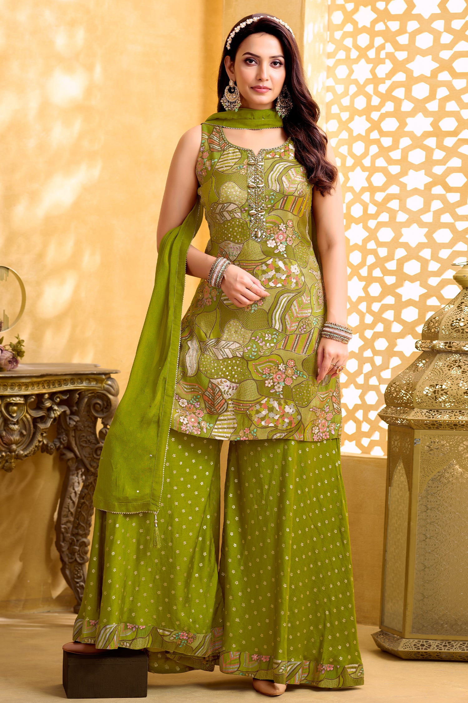Green Tissue Silk Printed Palazzo Suit worn by a model, showcasing intricate floral prints and stylish design.