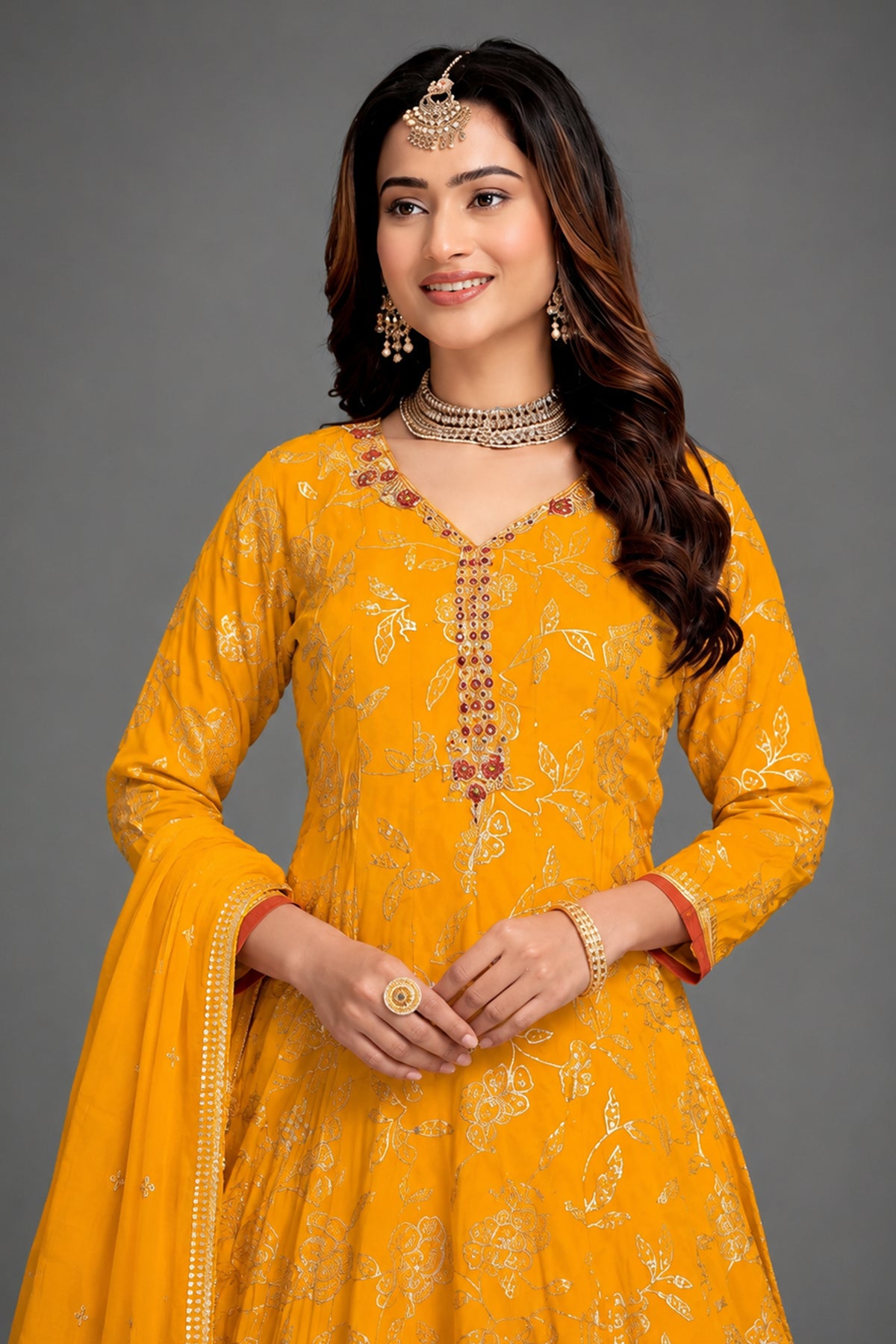 Yellow Crepe Silk Anarkali Palazzo Suit showcasing close up of premium fabric and sequin details