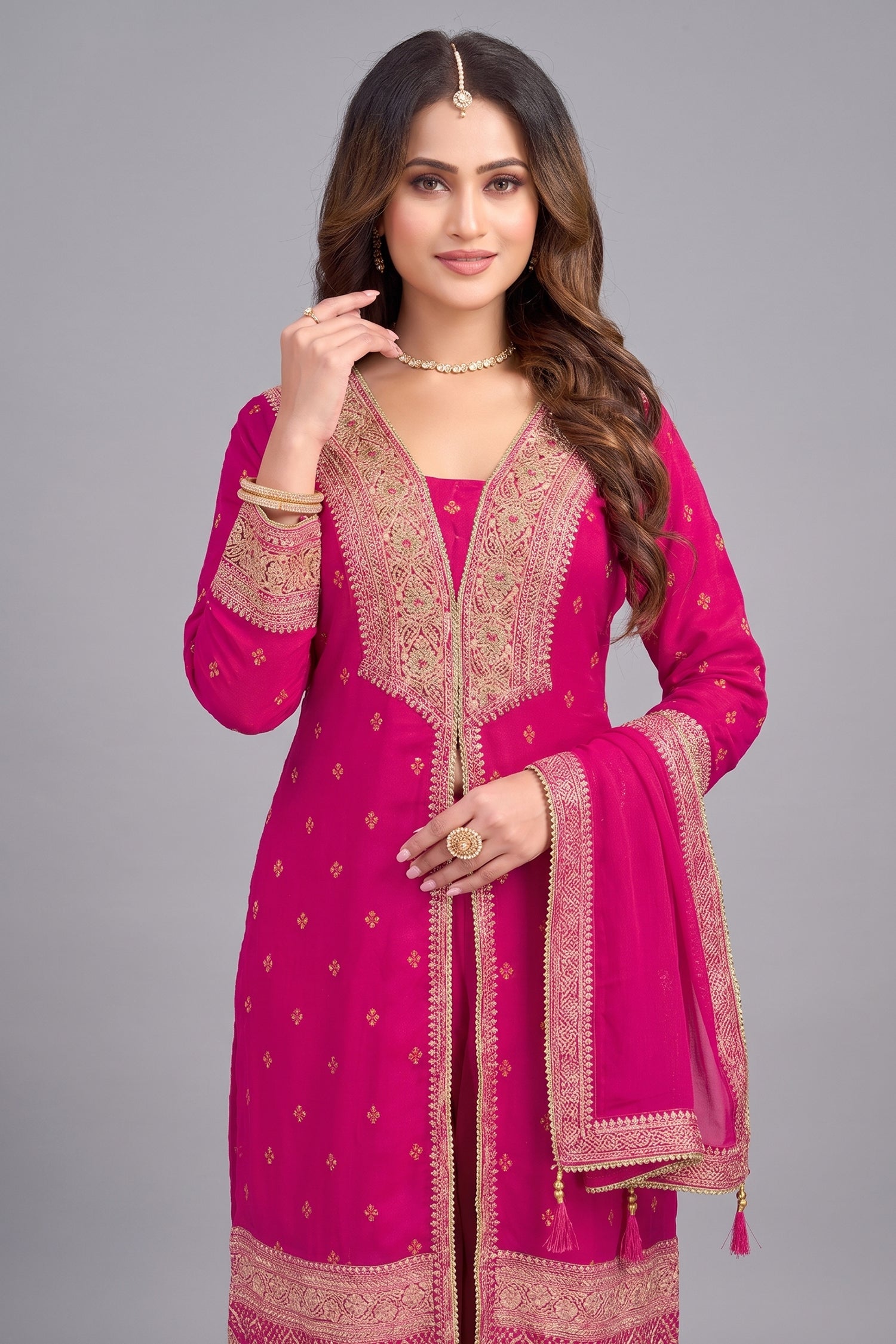 Close-up of Rani Pink Georgette Slit Cut Suit showing intricate embroidery and fabric texture