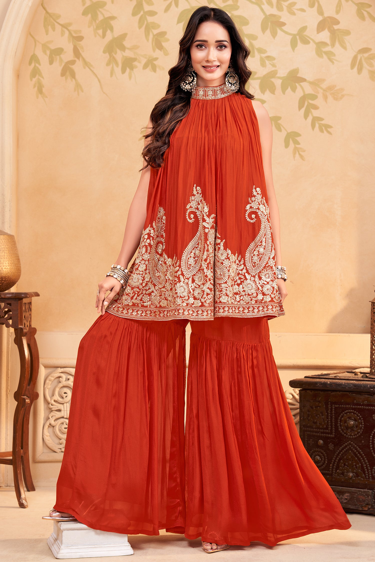 Full designer look of the orange georgette sequin embroidered sharara set with dupatta.