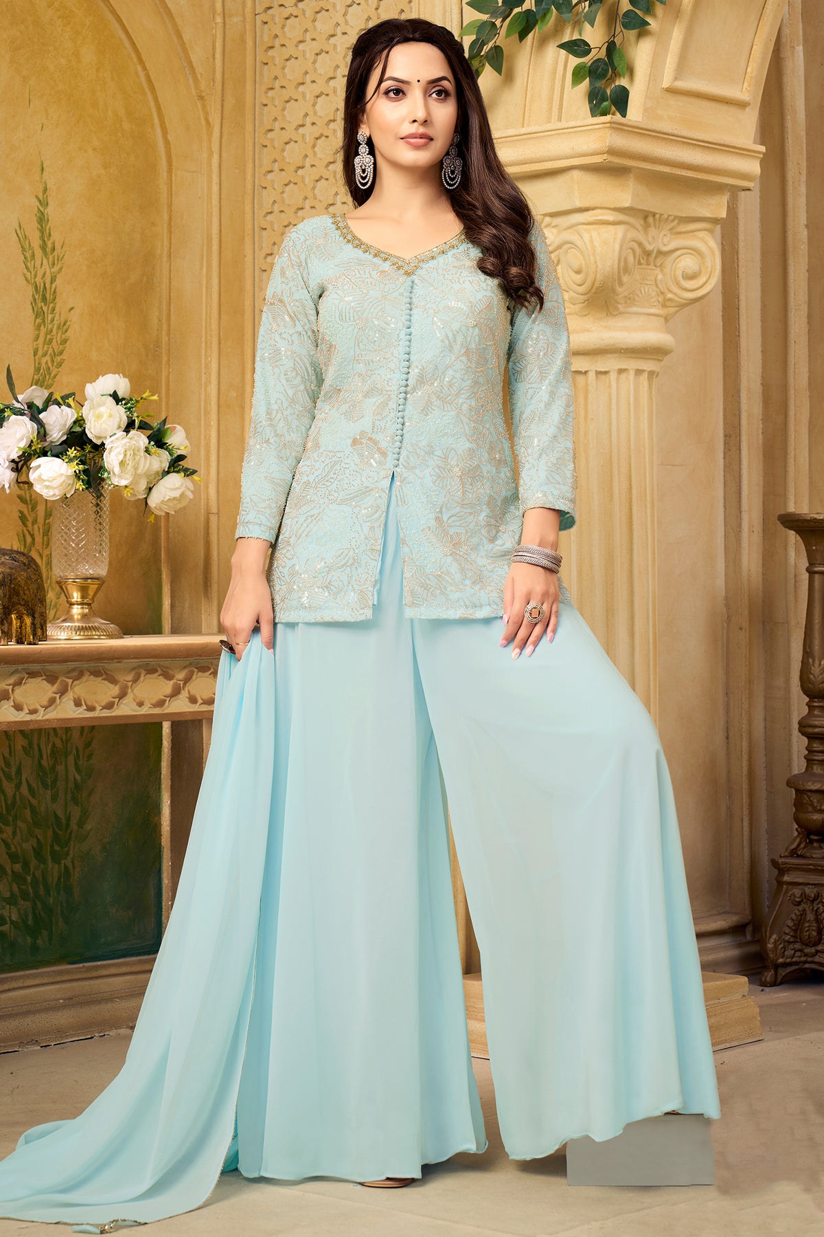 Light sky blue georgette palazzo suit with intricate sequin and cutdana handwork.