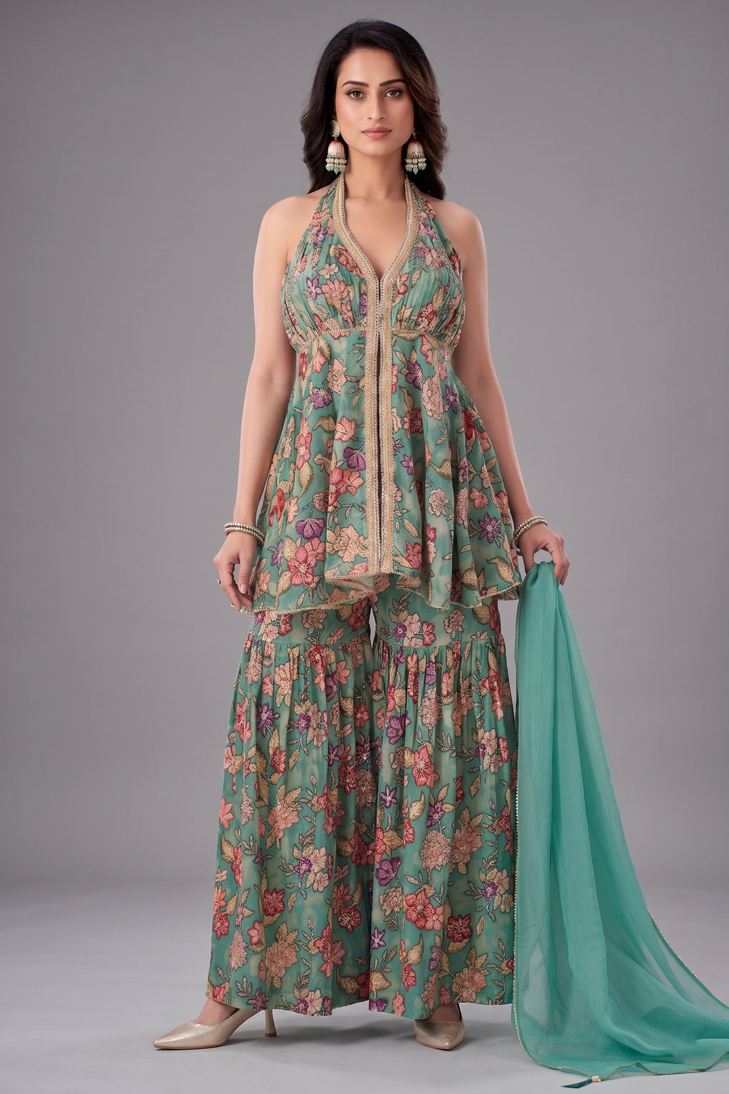 Sea green tissue sharara suit with floral print and sequin handwork.
