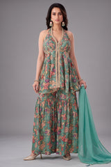Sea green tissue sharara suit with floral print and sequin handwork.