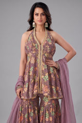 Close-up of the floral print and sequin detailing on the onion pink tissue fabric.