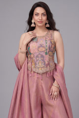 Detail of the printed crepe silk fabric and relaxed palazzo fit in onion pink.