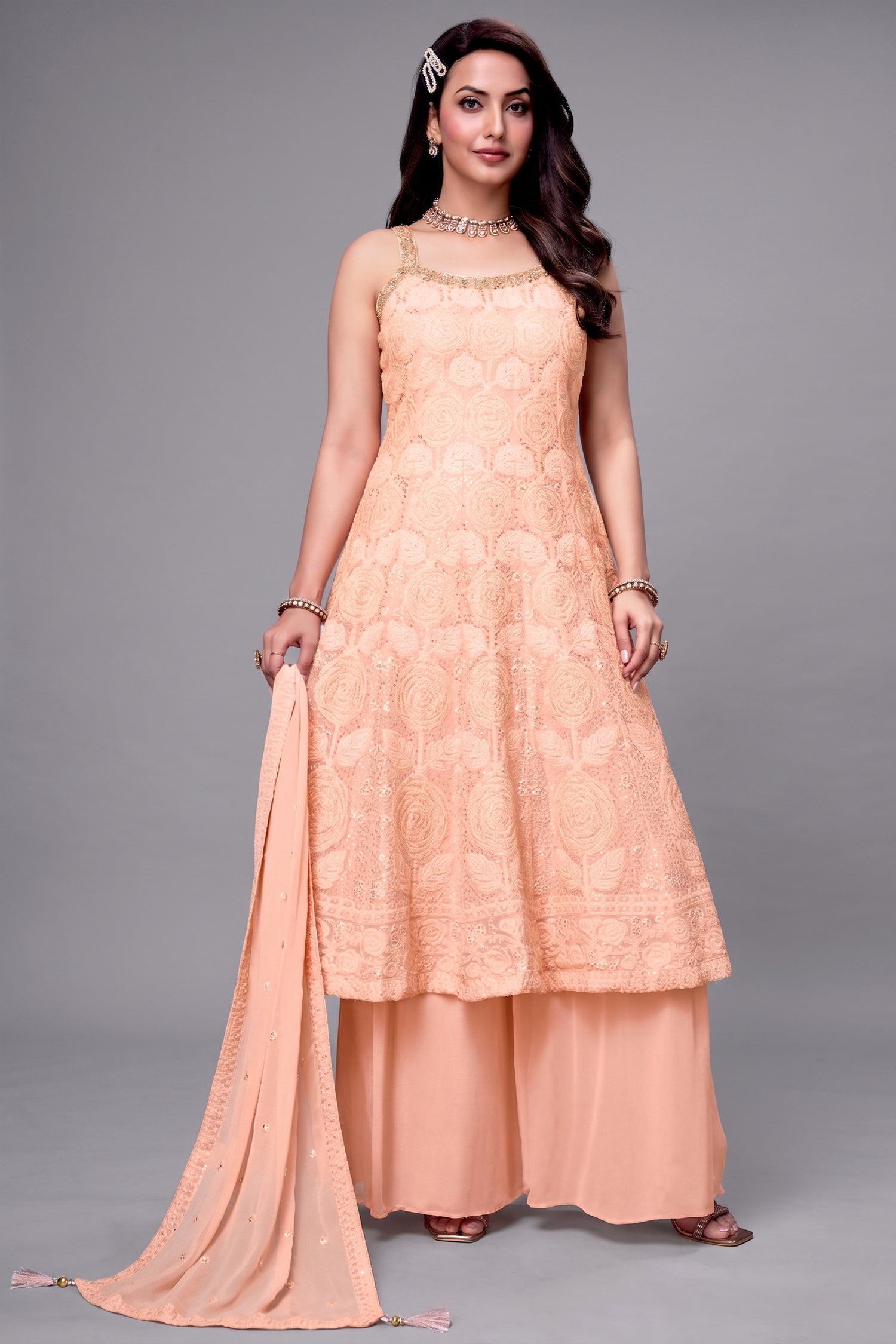Light peach georgette anarkali suit with floral embroidery and sequin work detail