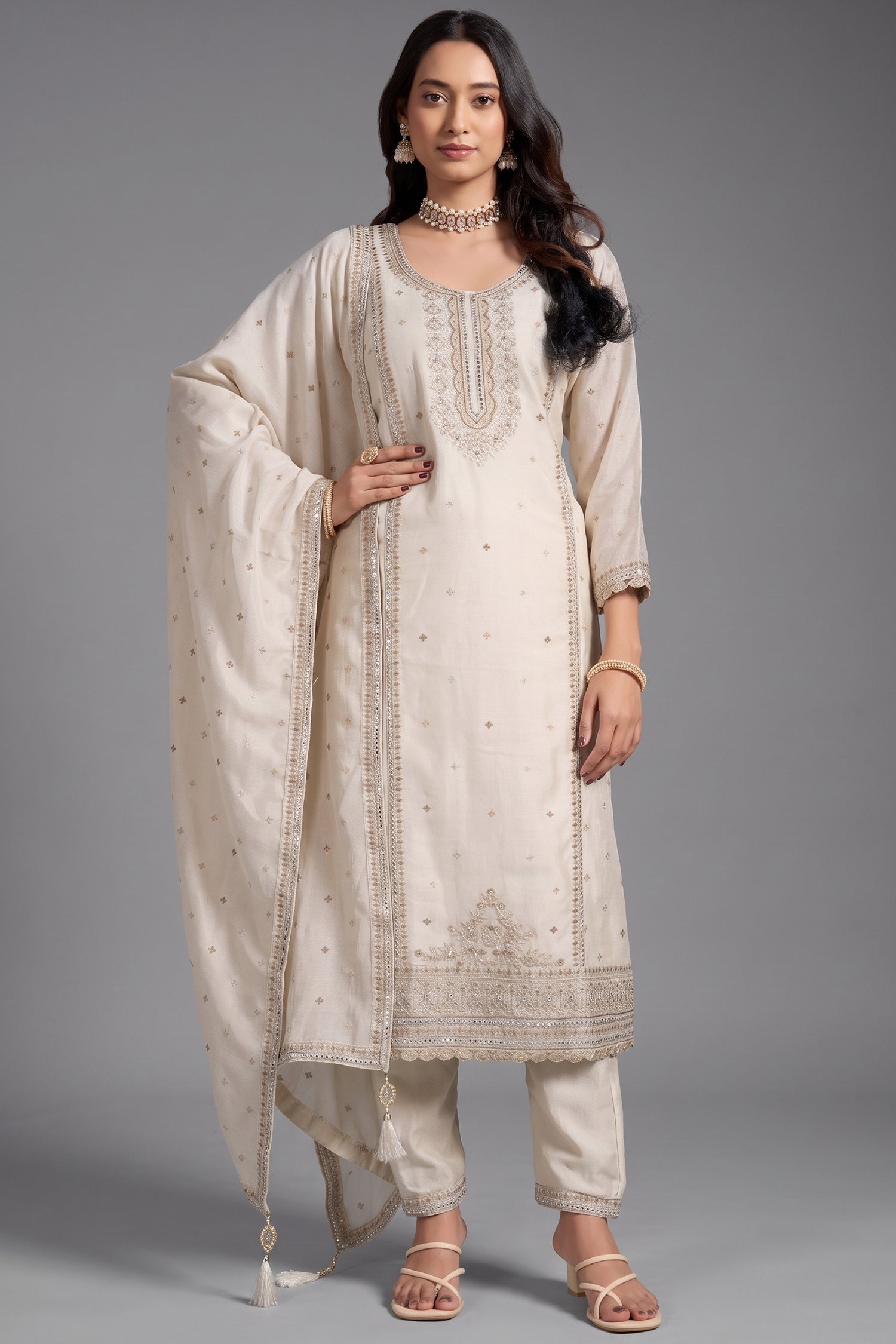 Opulent Creamy Ivory Art Silk Straight Cut Salwar Suit with Applique and Embroidery Work Main image