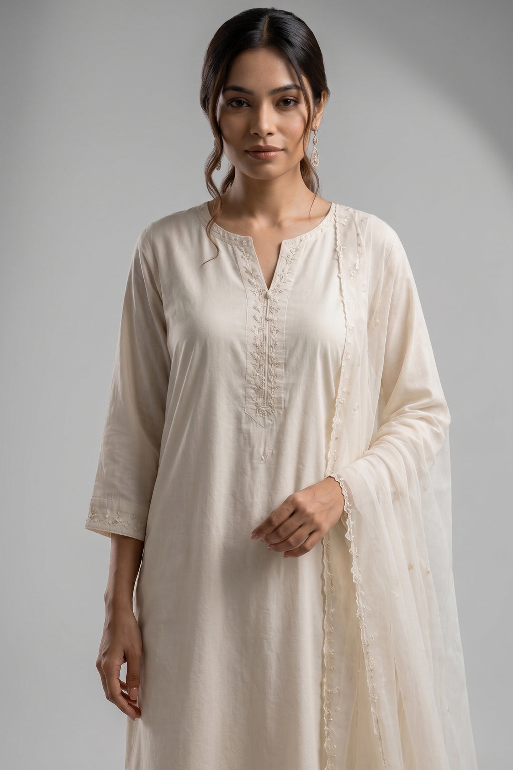 White Cotton Suit with Intricate Threadwork Embroidery