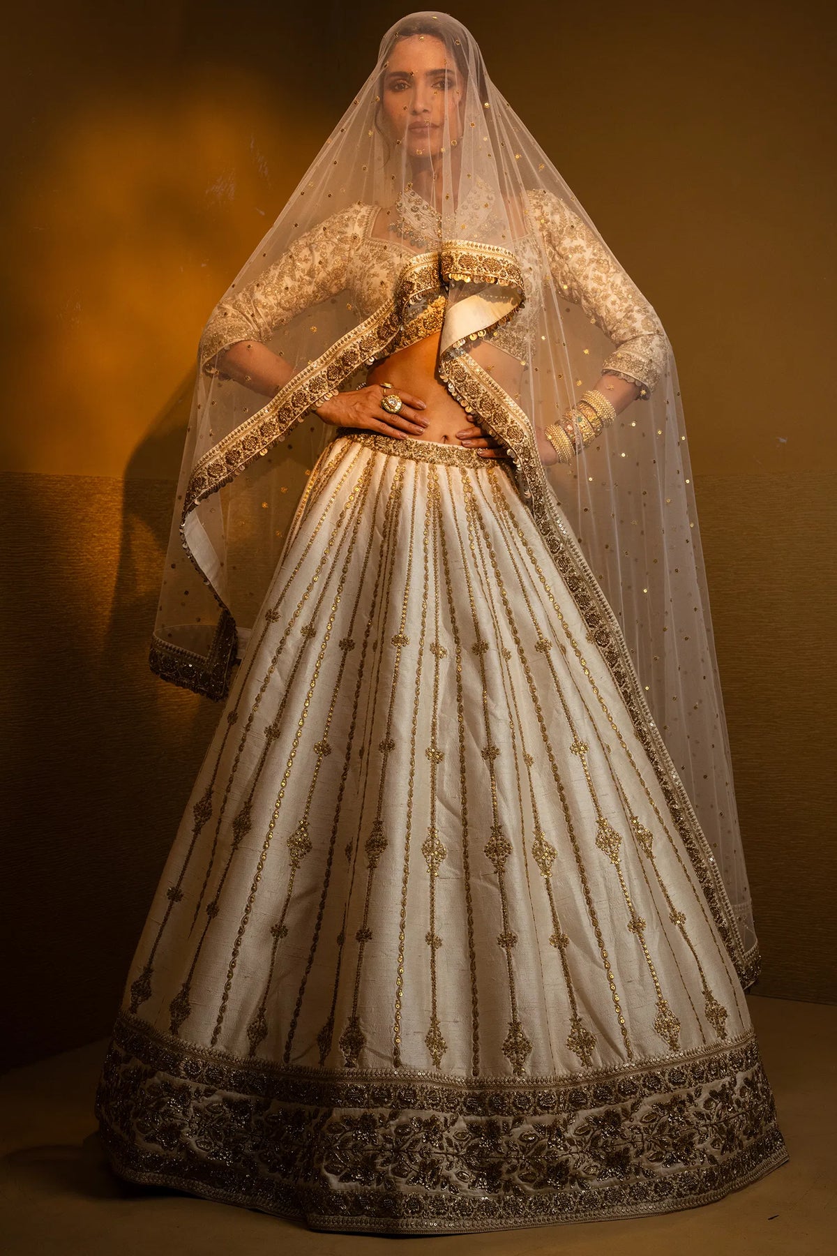 Cream Raw Silk Sequin Embroidered Designer Bridal Lehenga with Plunging Sweet Heart Neckline Blouse