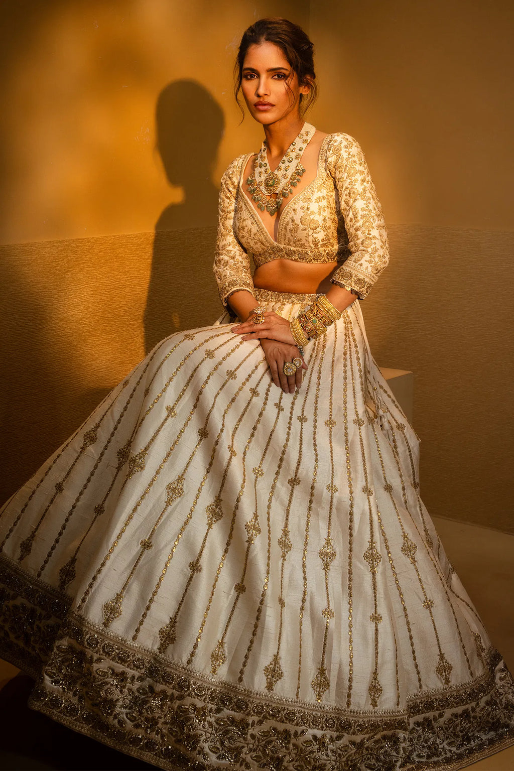 Cream Raw Silk Sequin Embroidered Designer Bridal Lehenga with Plunging Sweet Heart Neckline Blouse